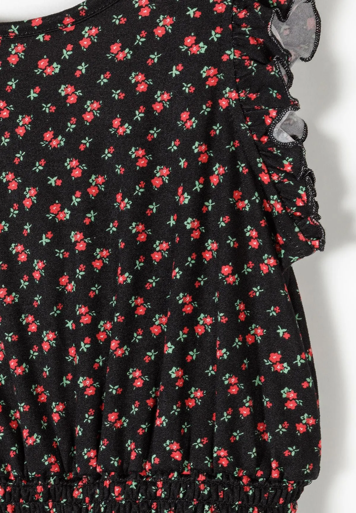Minoti 44654 playsuit sort blomstret til piger