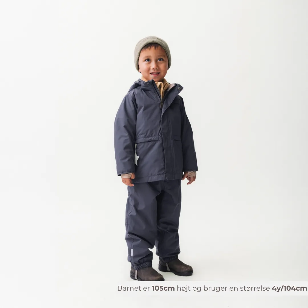MINI A TURE Matwilanso overtræksbukser Ombre blue 4y/104cm isoleret