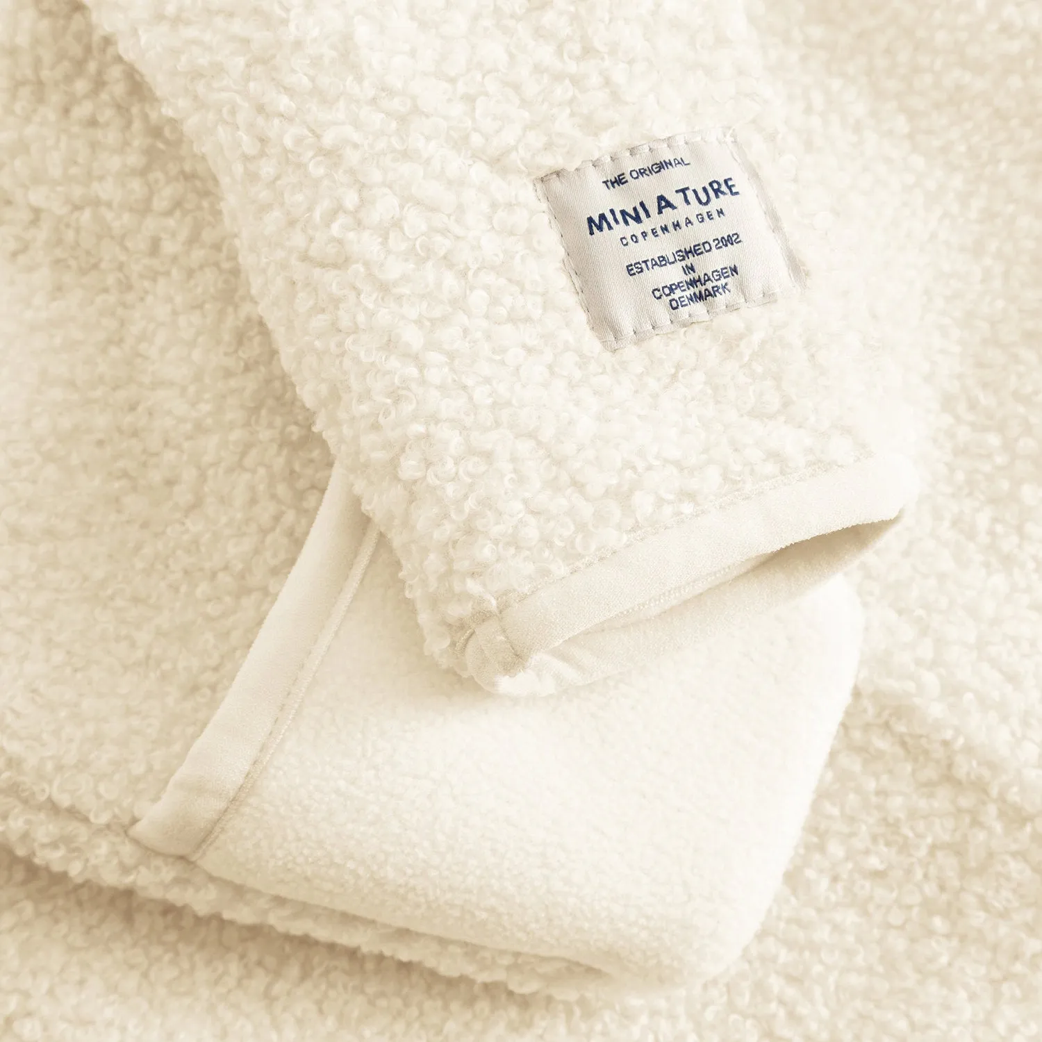 MINI A TURE MATADEL teddyfleece heldragt Angora cream