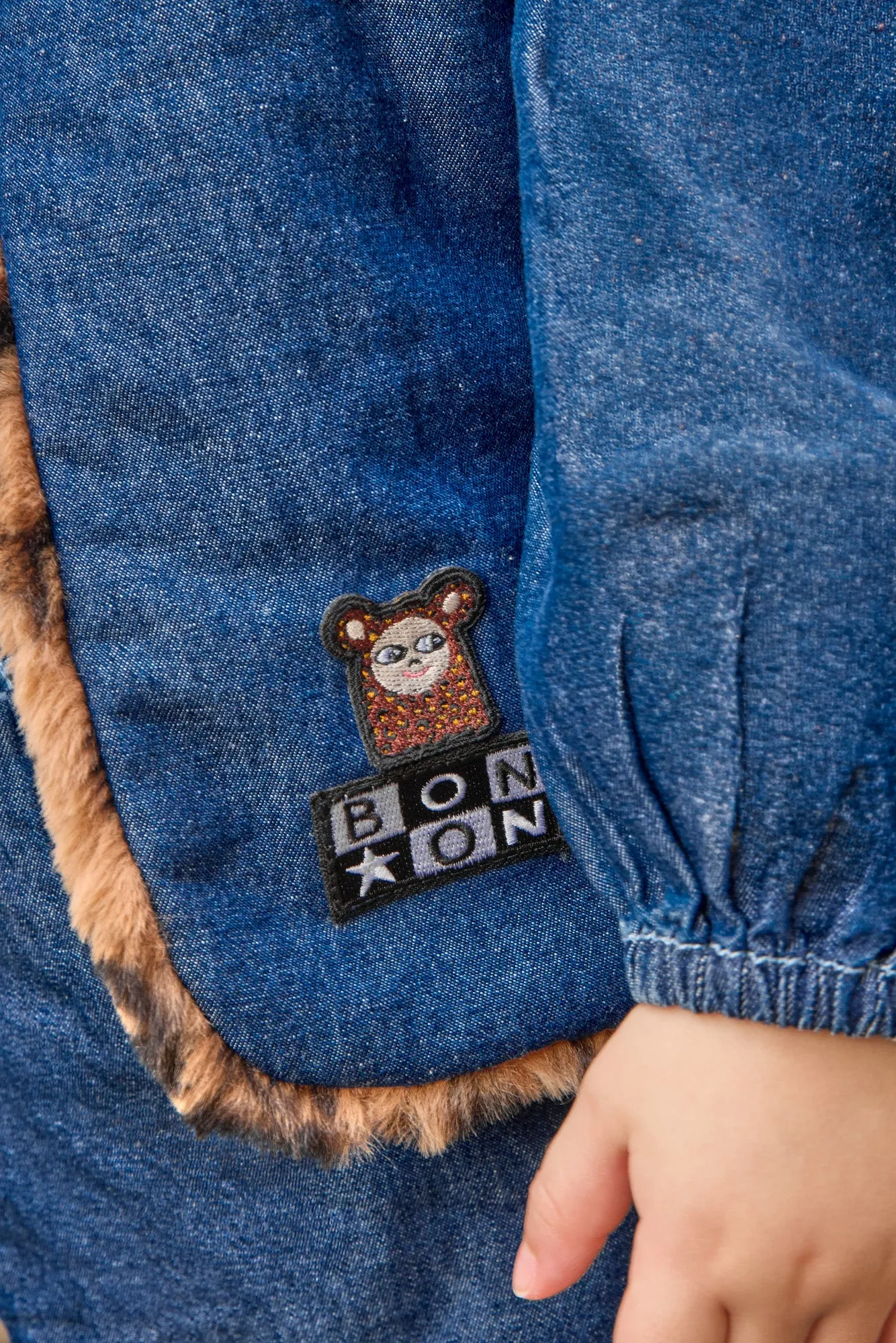 Bonton Beti Blue Denim vendbar vest baby