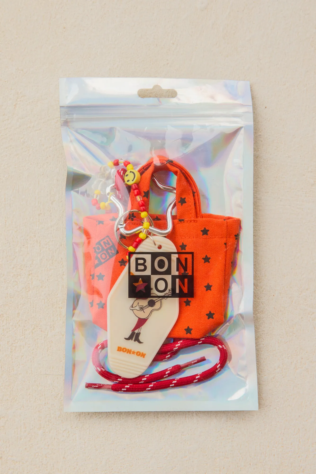 Bonton Grigri Cabas nøglering orange – mini taskevedhæng