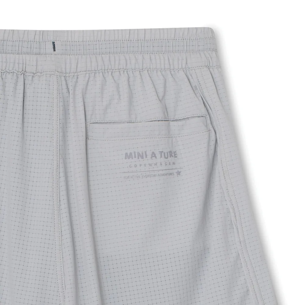 MINI A TURE Matsilas shorts Muted lime med leggings