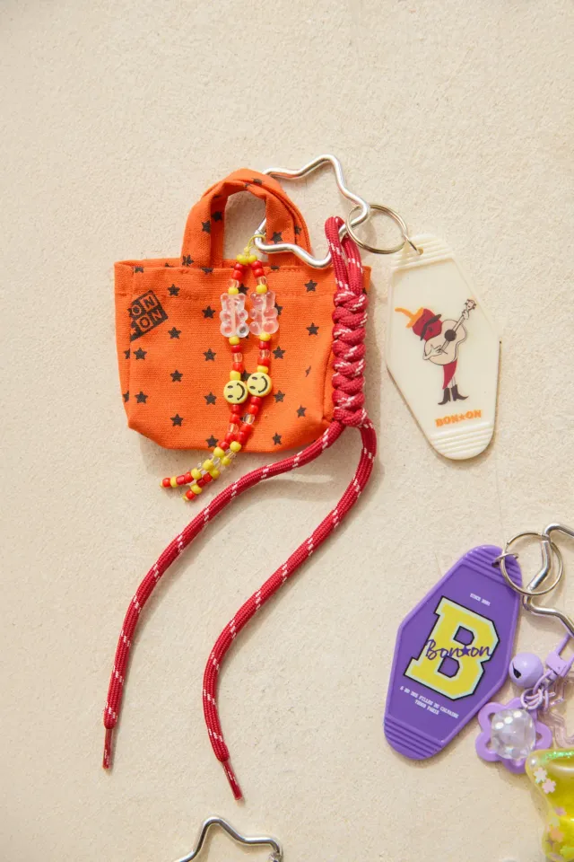 Bonton Grigri Cabas nøglering orange – mini taskevedhæng